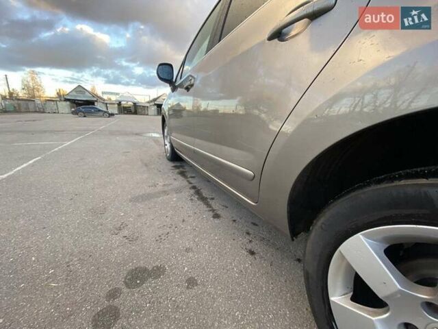 Коричневый Пежо 5008, объемом двигателя 1.6 л и пробегом 143 тыс. км за 8400 $, фото 6 на Automoto.ua