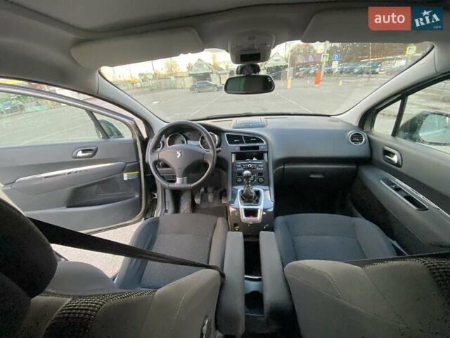 Коричневый Пежо 5008, объемом двигателя 1.6 л и пробегом 143 тыс. км за 8400 $, фото 54 на Automoto.ua