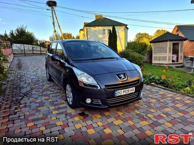 Серый Пежо 5008, объемом двигателя 1.6 л и пробегом 235 тыс. км за 7200 $, фото 4 на Automoto.ua