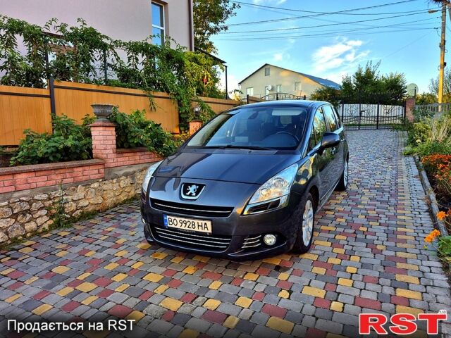 Серый Пежо 5008, объемом двигателя 1.6 л и пробегом 235 тыс. км за 7200 $, фото 3 на Automoto.ua