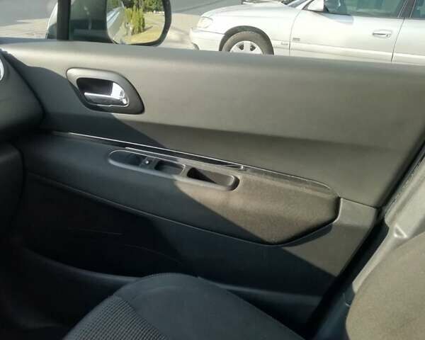 Серый Пежо 5008, объемом двигателя 1.6 л и пробегом 253 тыс. км за 6999 $, фото 6 на Automoto.ua