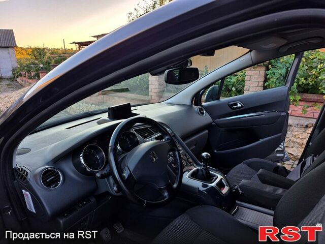 Серый Пежо 5008, объемом двигателя 1.6 л и пробегом 235 тыс. км за 7200 $, фото 1 на Automoto.ua