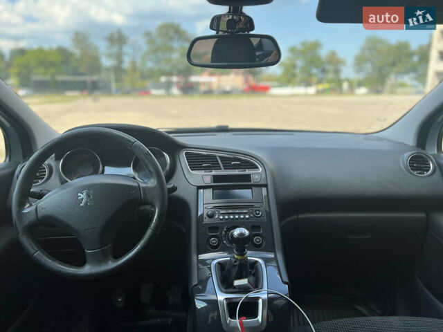 Серый Пежо 5008, объемом двигателя 1.6 л и пробегом 280 тыс. км за 6990 $, фото 9 на Automoto.ua