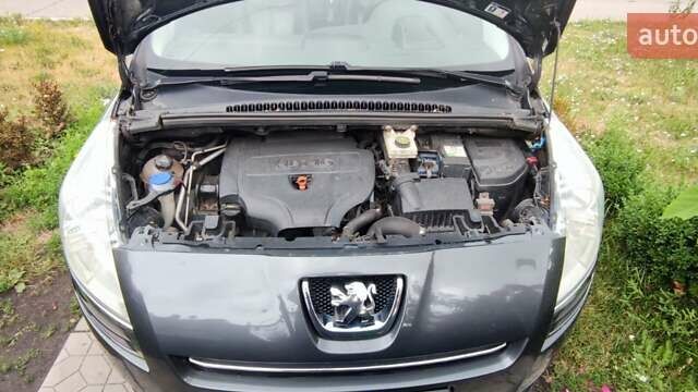 Серый Пежо 5008, объемом двигателя 2 л и пробегом 298 тыс. км за 9700 $, фото 18 на Automoto.ua
