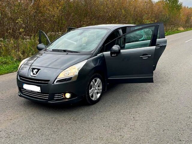 Сірий Пежо 5008, об'ємом двигуна 1.6 л та пробігом 235 тис. км за 7800 $, фото 1 на Automoto.ua