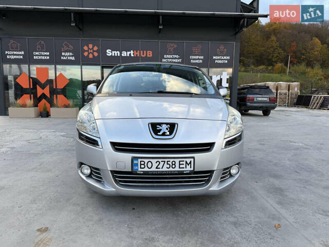 Серый Пежо 5008, объемом двигателя 1.56 л и пробегом 273 тыс. км за 7300 $, фото 1 на Automoto.ua
