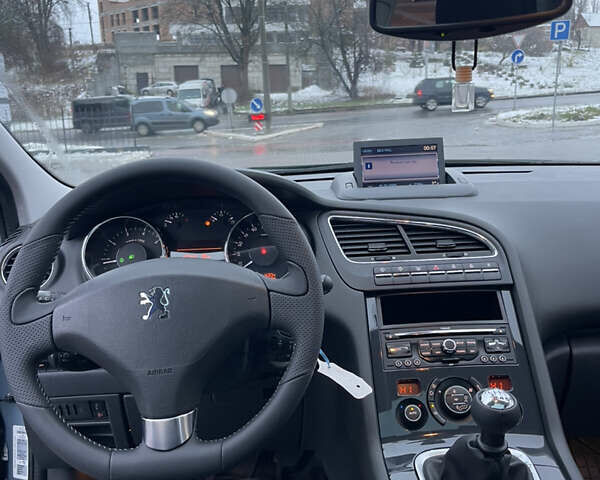 Серый Пежо 5008, объемом двигателя 1.6 л и пробегом 188 тыс. км за 6999 $, фото 26 на Automoto.ua