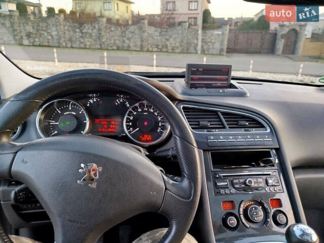 Серый Пежо 5008, объемом двигателя 1.56 л и пробегом 223 тыс. км за 8800 $, фото 13 на Automoto.ua