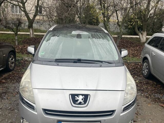 Серый Пежо 5008, объемом двигателя 1.6 л и пробегом 250 тыс. км за 7000 $, фото 1 на Automoto.ua