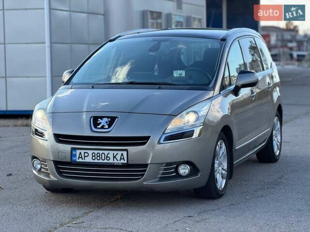 Серый Пежо 5008, объемом двигателя 1.6 л и пробегом 264 тыс. км за 8700 $, фото 1 на Automoto.ua