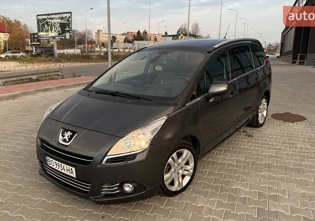 Серый Пежо 5008, объемом двигателя 2 л и пробегом 211 тыс. км за 10699 $, фото 1 на Automoto.ua