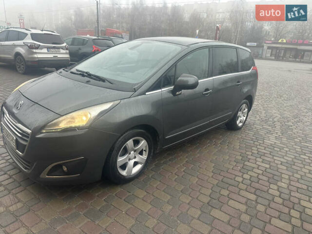 Серый Пежо 5008, объемом двигателя 1.6 л и пробегом 260 тыс. км за 10777 $, фото 1 на Automoto.ua
