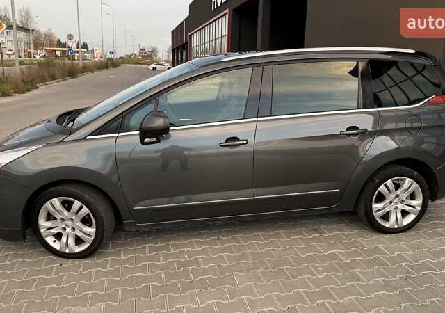 Серый Пежо 5008, объемом двигателя 2 л и пробегом 211 тыс. км за 10699 $, фото 4 на Automoto.ua