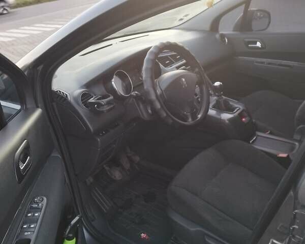 Сірий Пежо 5008, об'ємом двигуна 1.6 л та пробігом 256 тис. км за 8300 $, фото 4 на Automoto.ua