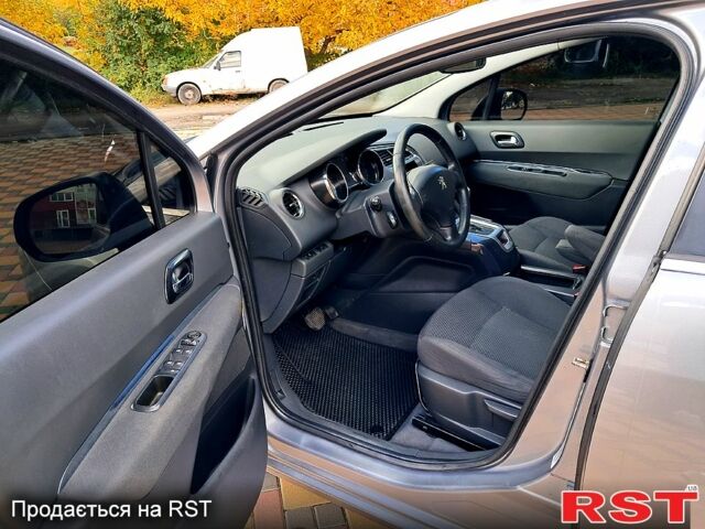 Серый Пежо 5008, объемом двигателя 1.6 л и пробегом 140 тыс. км за 9999 $, фото 9 на Automoto.ua