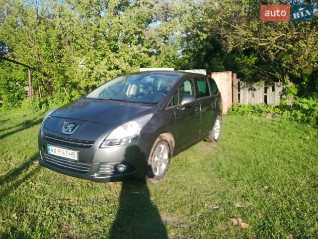 Серый Пежо 5008, объемом двигателя 2 л и пробегом 242 тыс. км за 7200 $, фото 1 на Automoto.ua