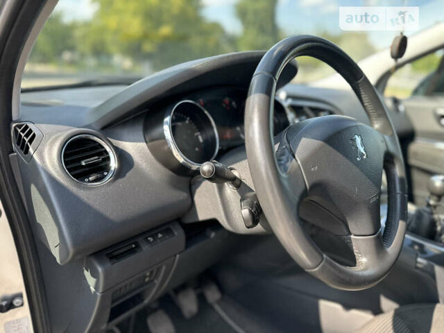 Серый Пежо 5008, объемом двигателя 1.56 л и пробегом 271 тыс. км за 6850 $, фото 41 на Automoto.ua