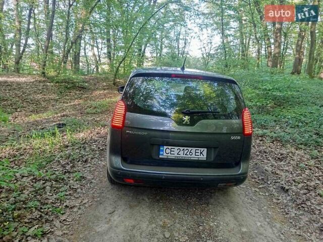Серый Пежо 5008, объемом двигателя 1.6 л и пробегом 270 тыс. км за 7500 $, фото 25 на Automoto.ua
