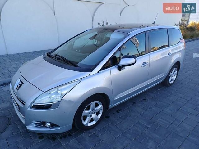 Серый Пежо 5008, объемом двигателя 2 л и пробегом 264 тыс. км за 9900 $, фото 4 на Automoto.ua