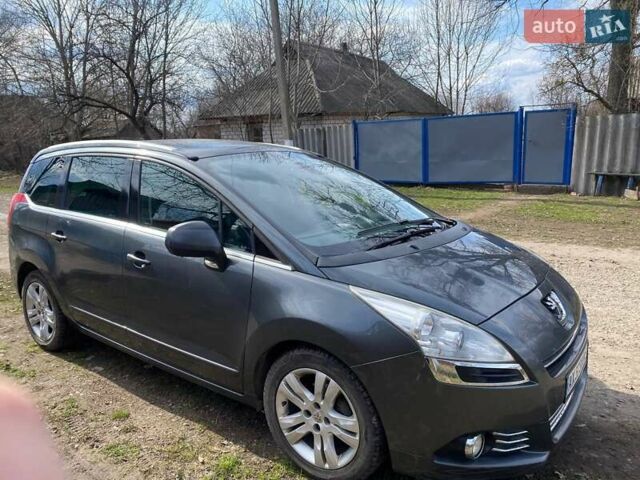 Серый Пежо 5008, объемом двигателя 1.6 л и пробегом 294 тыс. км за 7600 $, фото 2 на Automoto.ua