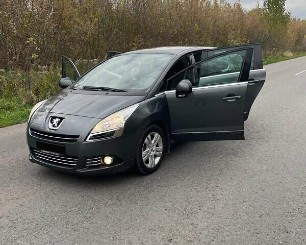 Сірий Пежо 5008, об'ємом двигуна 1.56 л та пробігом 235 тис. км за 7800 $, фото 1 на Automoto.ua