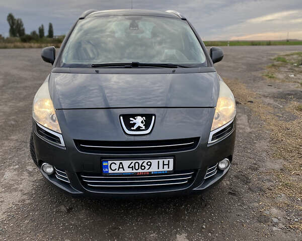 Серый Пежо 5008, объемом двигателя 1.6 л и пробегом 226 тыс. км за 8000 $, фото 4 на Automoto.ua