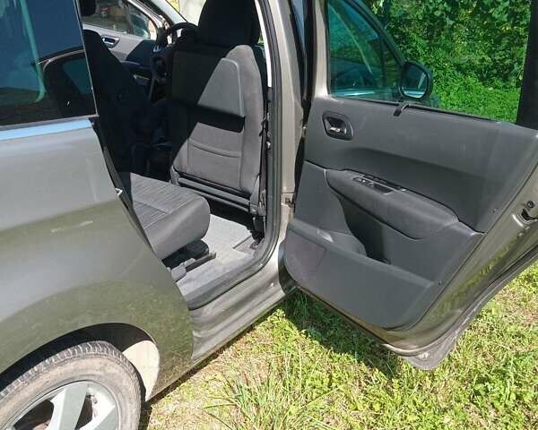 Серый Пежо 5008, объемом двигателя 1.6 л и пробегом 230 тыс. км за 8500 $, фото 4 на Automoto.ua