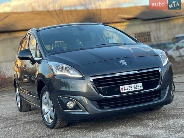 Серый Пежо 5008, объемом двигателя 2 л и пробегом 184 тыс. км за 11650 $, фото 1 на Automoto.ua