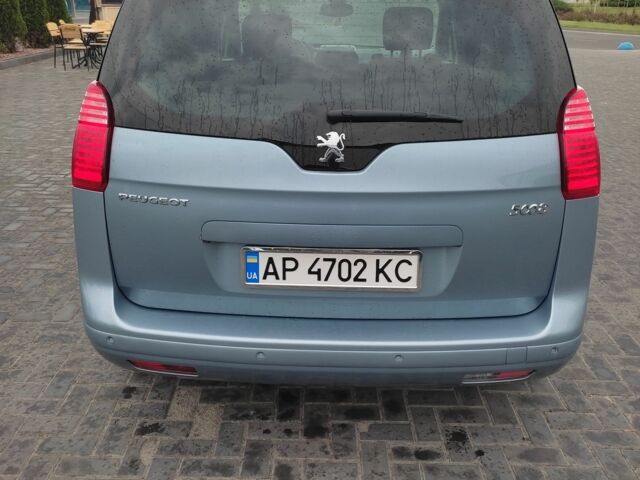 Синий Пежо 5008, объемом двигателя 1.6 л и пробегом 228 тыс. км за 7500 $, фото 1 на Automoto.ua