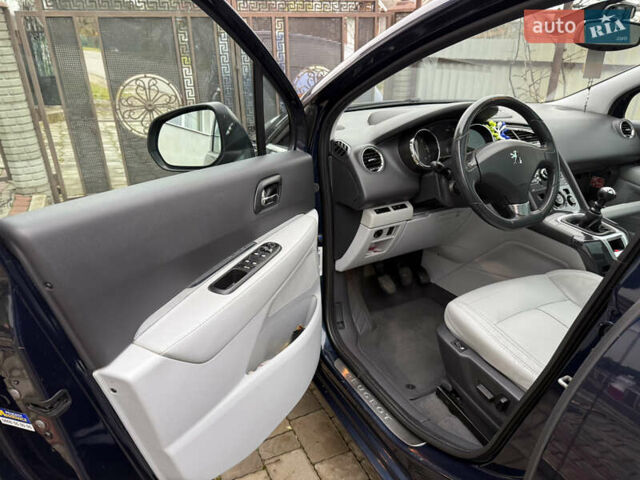 Синій Пежо 5008, об'ємом двигуна 2 л та пробігом 206 тис. км за 9800 $, фото 11 на Automoto.ua