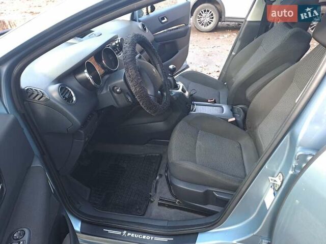 Синий Пежо 5008, объемом двигателя 1.56 л и пробегом 237 тыс. км за 9600 $, фото 11 на Automoto.ua