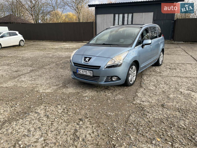 Синий Пежо 5008, объемом двигателя 1.6 л и пробегом 228 тыс. км за 7400 $, фото 1 на Automoto.ua