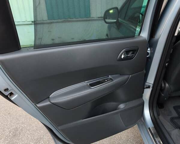 Синий Пежо 5008, объемом двигателя 2 л и пробегом 199 тыс. км за 6500 $, фото 15 на Automoto.ua