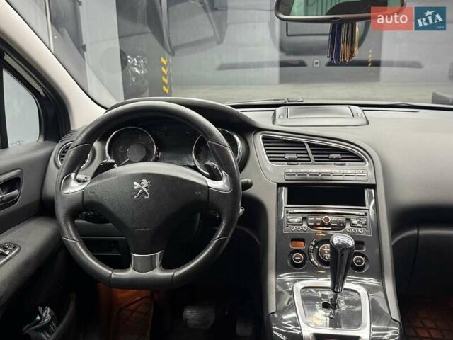 Синий Пежо 5008, объемом двигателя 1.56 л и пробегом 264 тыс. км за 10700 $, фото 14 на Automoto.ua