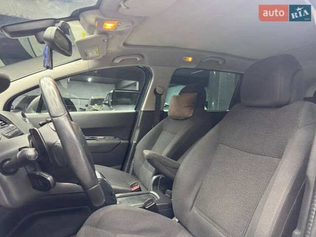 Синий Пежо 5008, объемом двигателя 1.56 л и пробегом 264 тыс. км за 10700 $, фото 7 на Automoto.ua