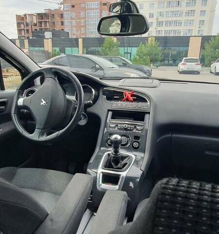 Синий Пежо 5008, объемом двигателя 1.56 л и пробегом 222 тыс. км за 8300 $, фото 15 на Automoto.ua