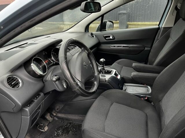 Синий Пежо 5008, объемом двигателя 2 л и пробегом 265 тыс. км за 6850 $, фото 6 на Automoto.ua