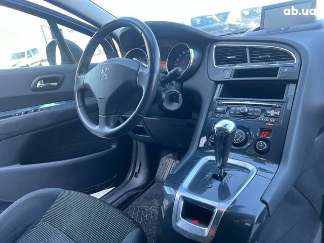 Синий Пежо 5008, объемом двигателя 1.6 л и пробегом 260 тыс. км за 8390 $, фото 35 на Automoto.ua