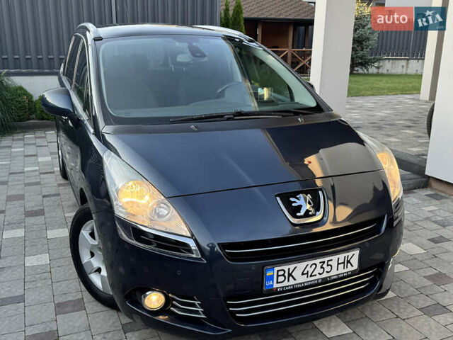 Синий Пежо 5008, объемом двигателя 1.6 л и пробегом 283 тыс. км за 8000 $, фото 4 на Automoto.ua