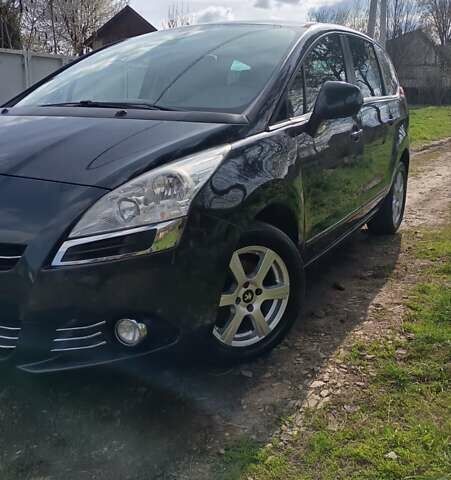Синий Пежо 5008, объемом двигателя 1.6 л и пробегом 267 тыс. км за 9200 $, фото 1 на Automoto.ua