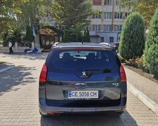 Синий Пежо 5008, объемом двигателя 1.56 л и пробегом 264 тыс. км за 10800 $, фото 4 на Automoto.ua
