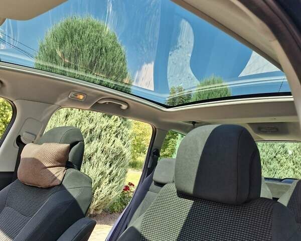 Синий Пежо 5008, объемом двигателя 1.56 л и пробегом 264 тыс. км за 10800 $, фото 15 на Automoto.ua