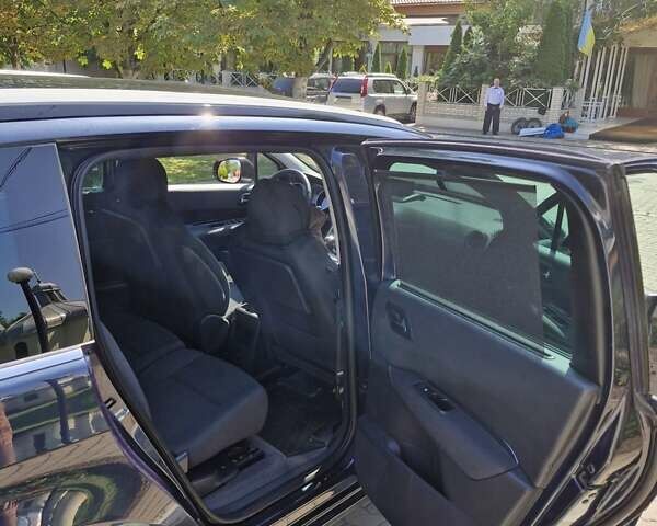 Синий Пежо 5008, объемом двигателя 1.56 л и пробегом 264 тыс. км за 10800 $, фото 7 на Automoto.ua