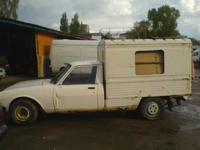 Белый Пежо 504, объемом двигателя 2.3 л и пробегом 300 тыс. км за 1300 $, фото 3 на Automoto.ua