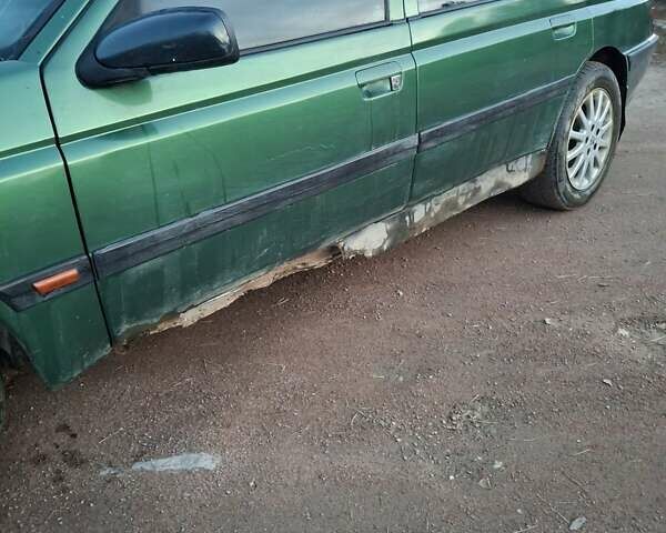 Зеленый Пежо 605, объемом двигателя 2.96 л и пробегом 777 тыс. км за 900 $, фото 1 на Automoto.ua