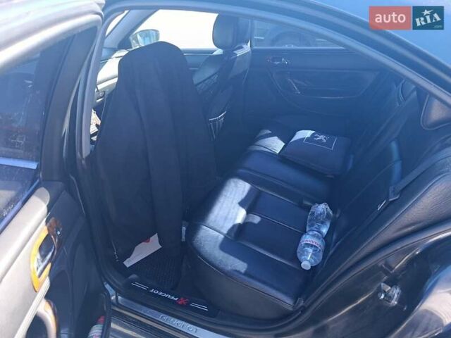 Черный Пежо 607, объемом двигателя 2.96 л и пробегом 290 тыс. км за 4500 $, фото 2 на Automoto.ua