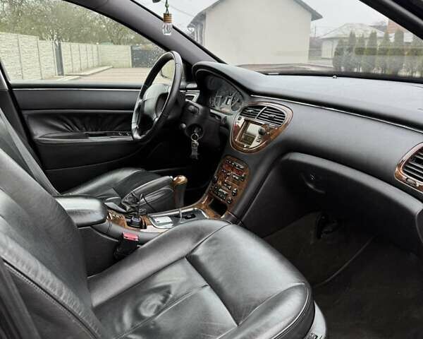 Черный Пежо 607, объемом двигателя 2.2 л и пробегом 292 тыс. км за 4500 $, фото 21 на Automoto.ua