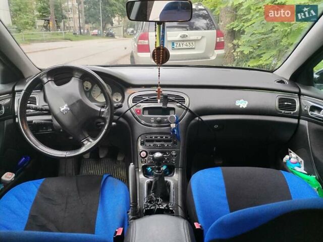 Черный Пежо 607, объемом двигателя 2.2 л и пробегом 460 тыс. км за 2124 $, фото 5 на Automoto.ua