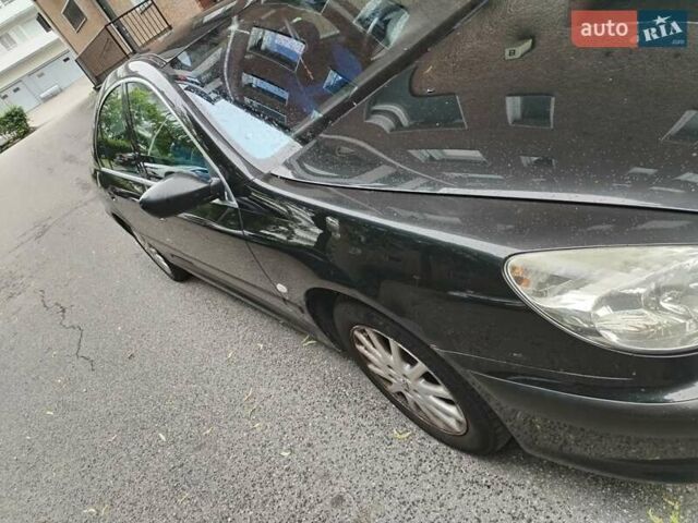 Черный Пежо 607, объемом двигателя 2.2 л и пробегом 460 тыс. км за 2124 $, фото 1 на Automoto.ua