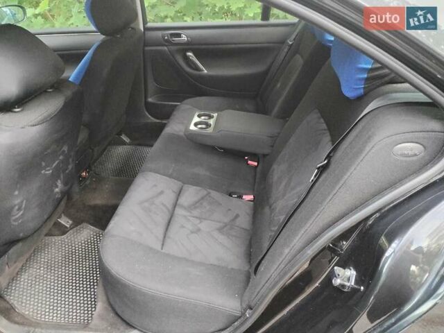 Черный Пежо 607, объемом двигателя 2.2 л и пробегом 460 тыс. км за 2124 $, фото 6 на Automoto.ua